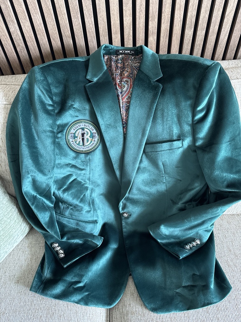 The ABDGI Green Jacket — the tournament's championship trophy awarded to the lowest 3-round score